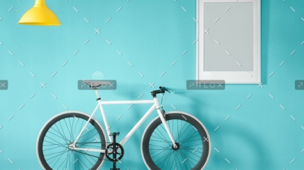 white bike in blue interior PMNFYVU